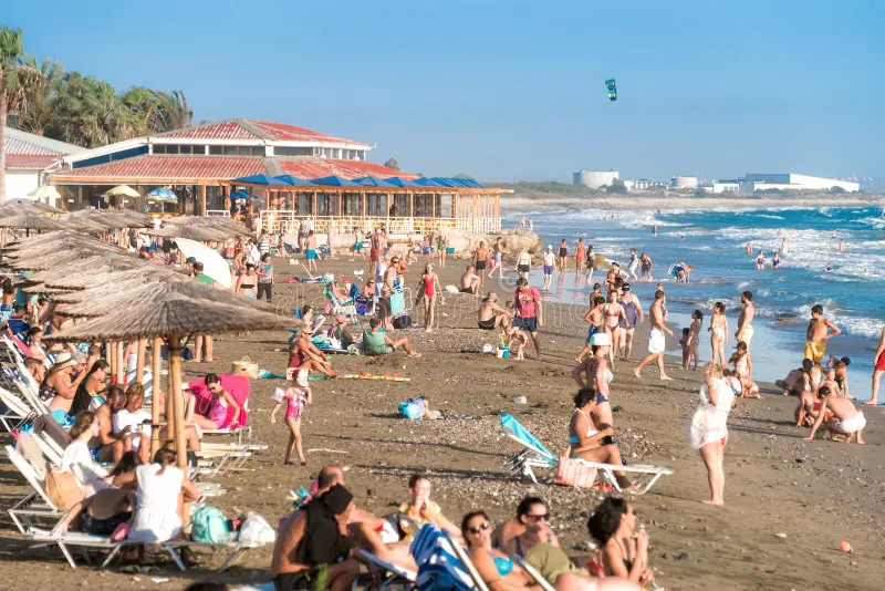 kourion cyprus august crowd tourists relaxing famous agios ermogenis beach 257854095